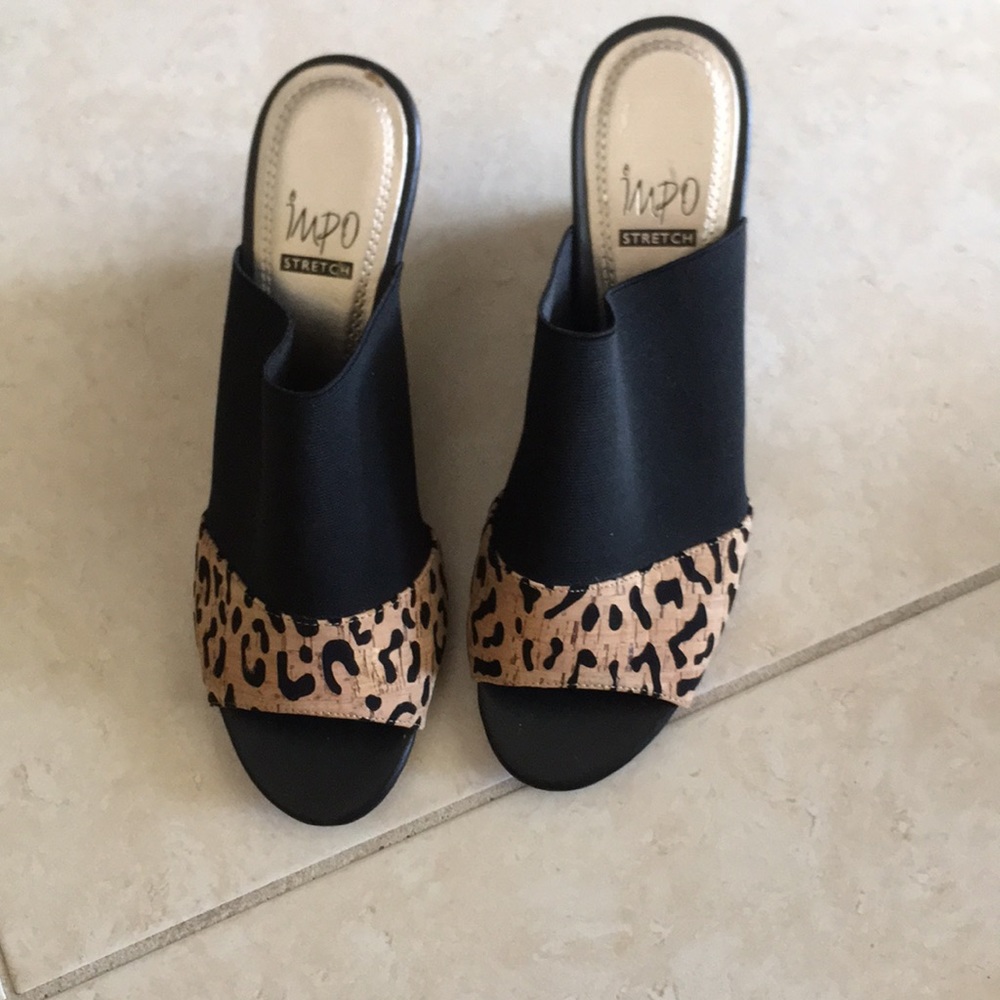 Shoes. Black material stretches